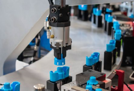 Pick and place gripper on production line